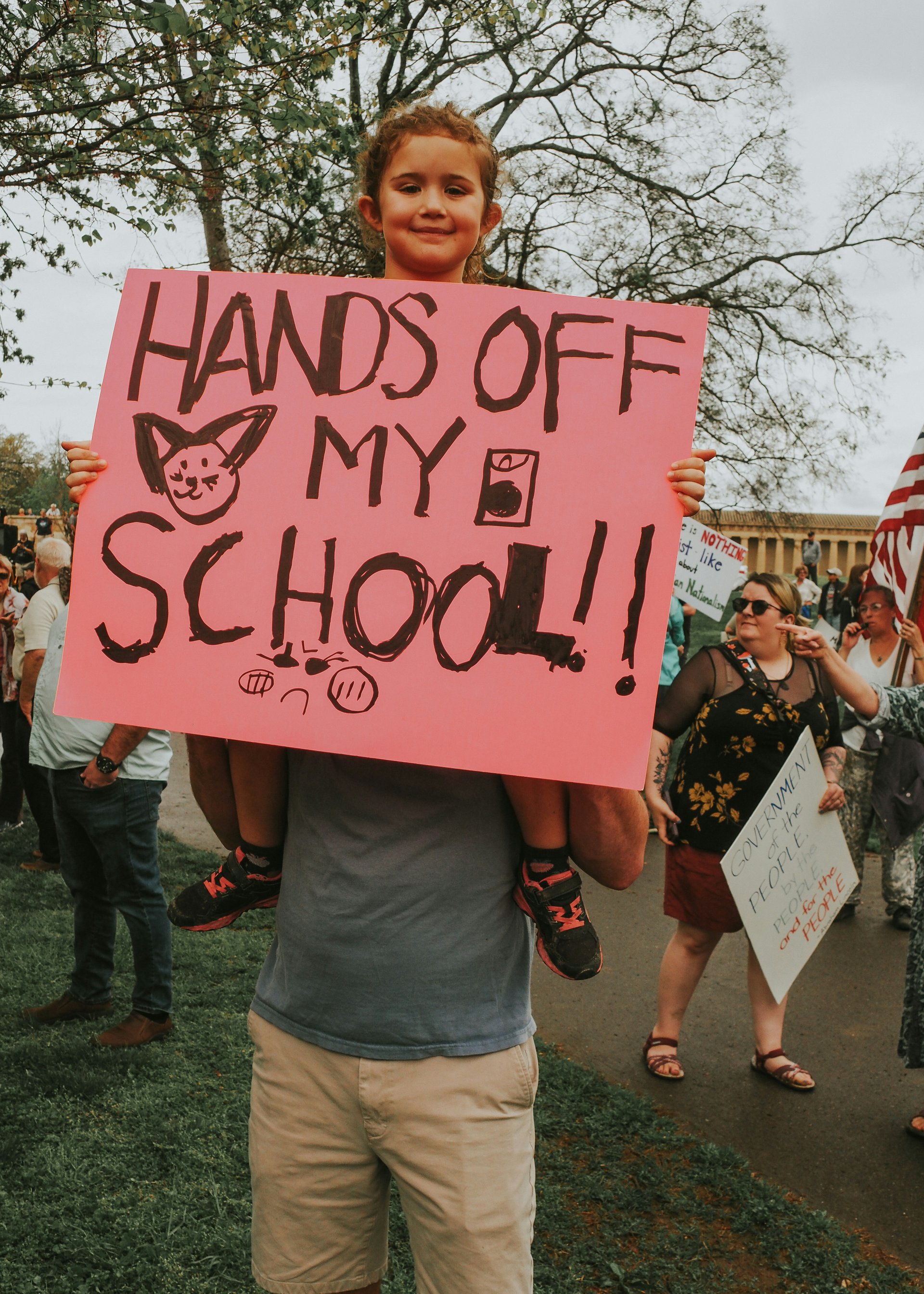 A young person at a school protest