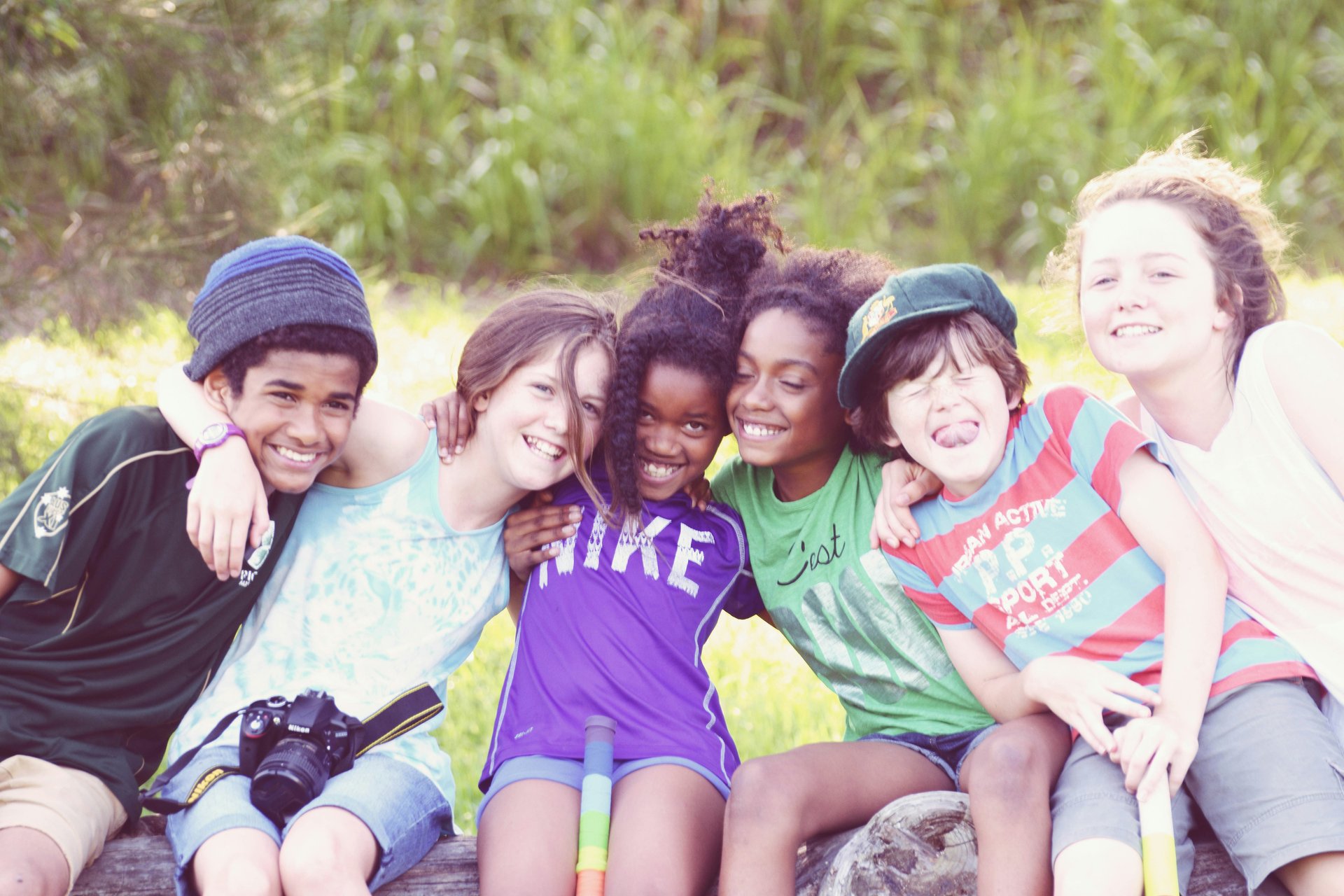 Group of young people sitting together