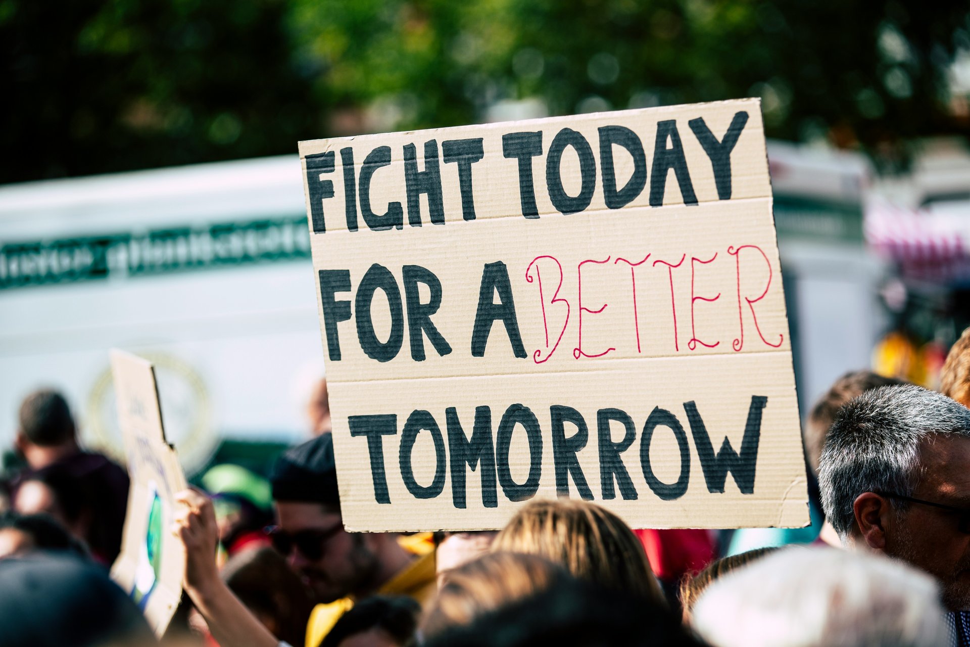 Person holding a protest sign