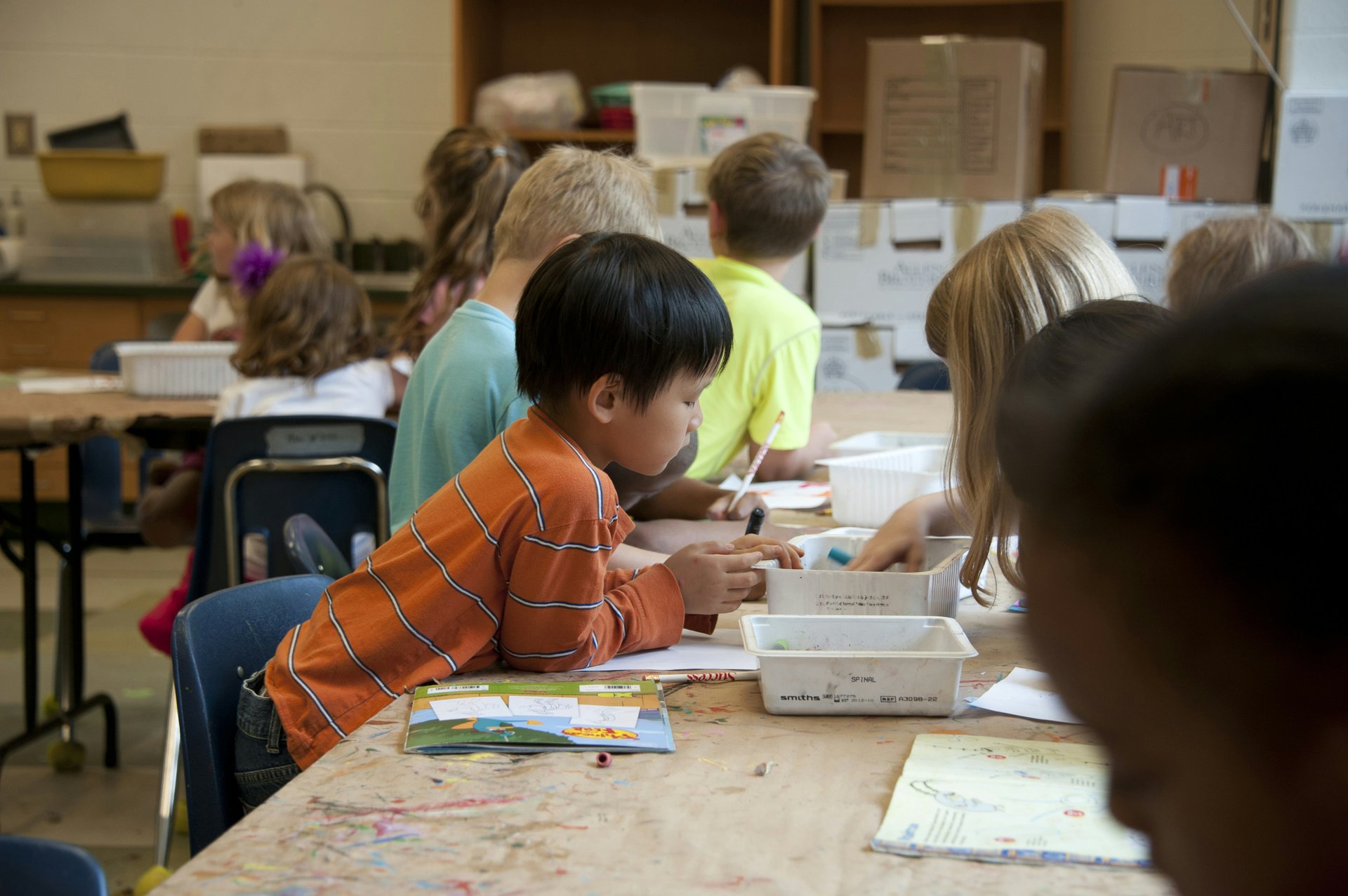 Kids working together on an art project